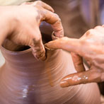Doug Fitch and Hannah McAndrew making a jug for me